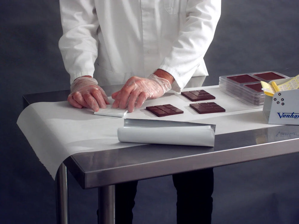 Chocolate being wrapped by hand